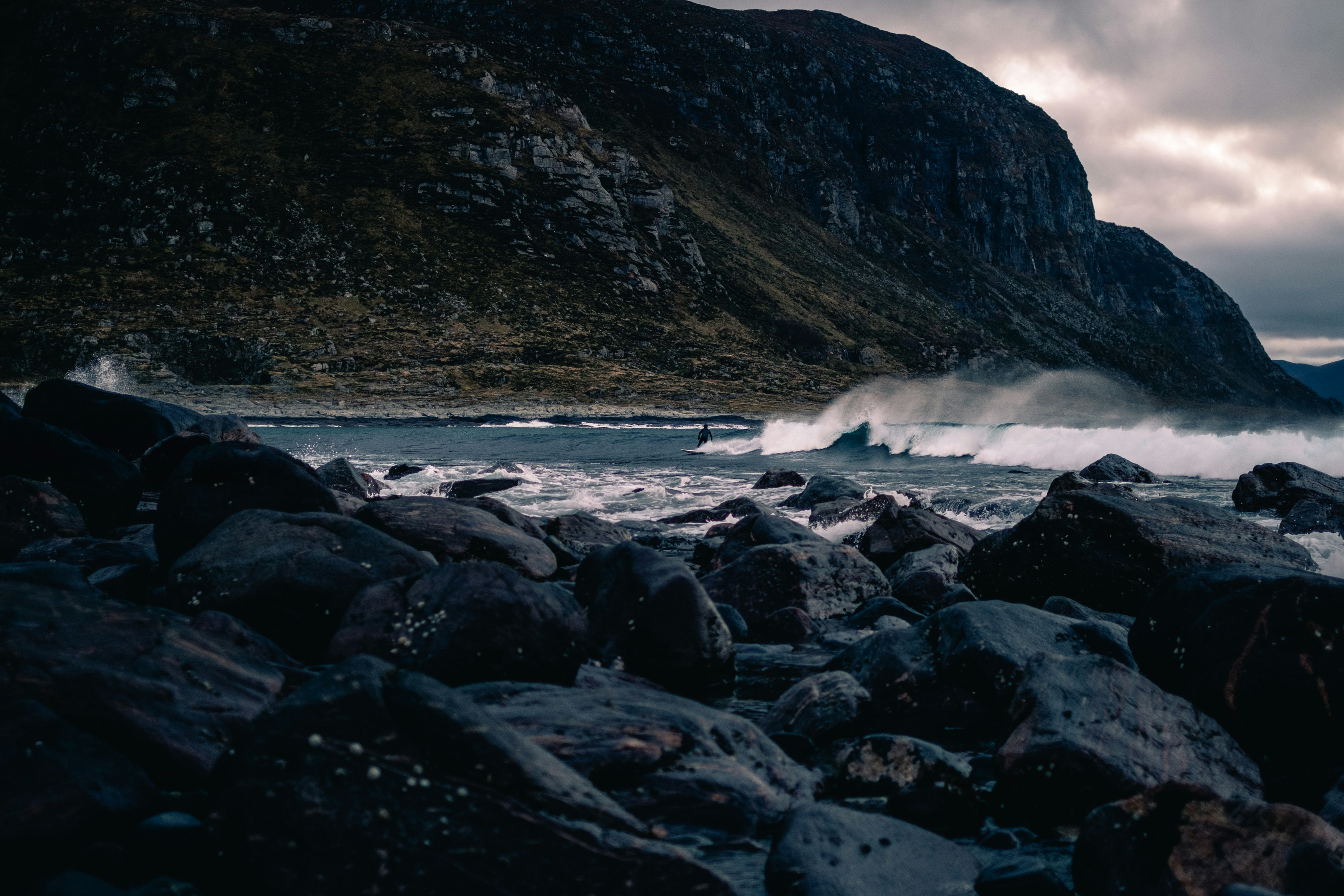 black rocks near sea